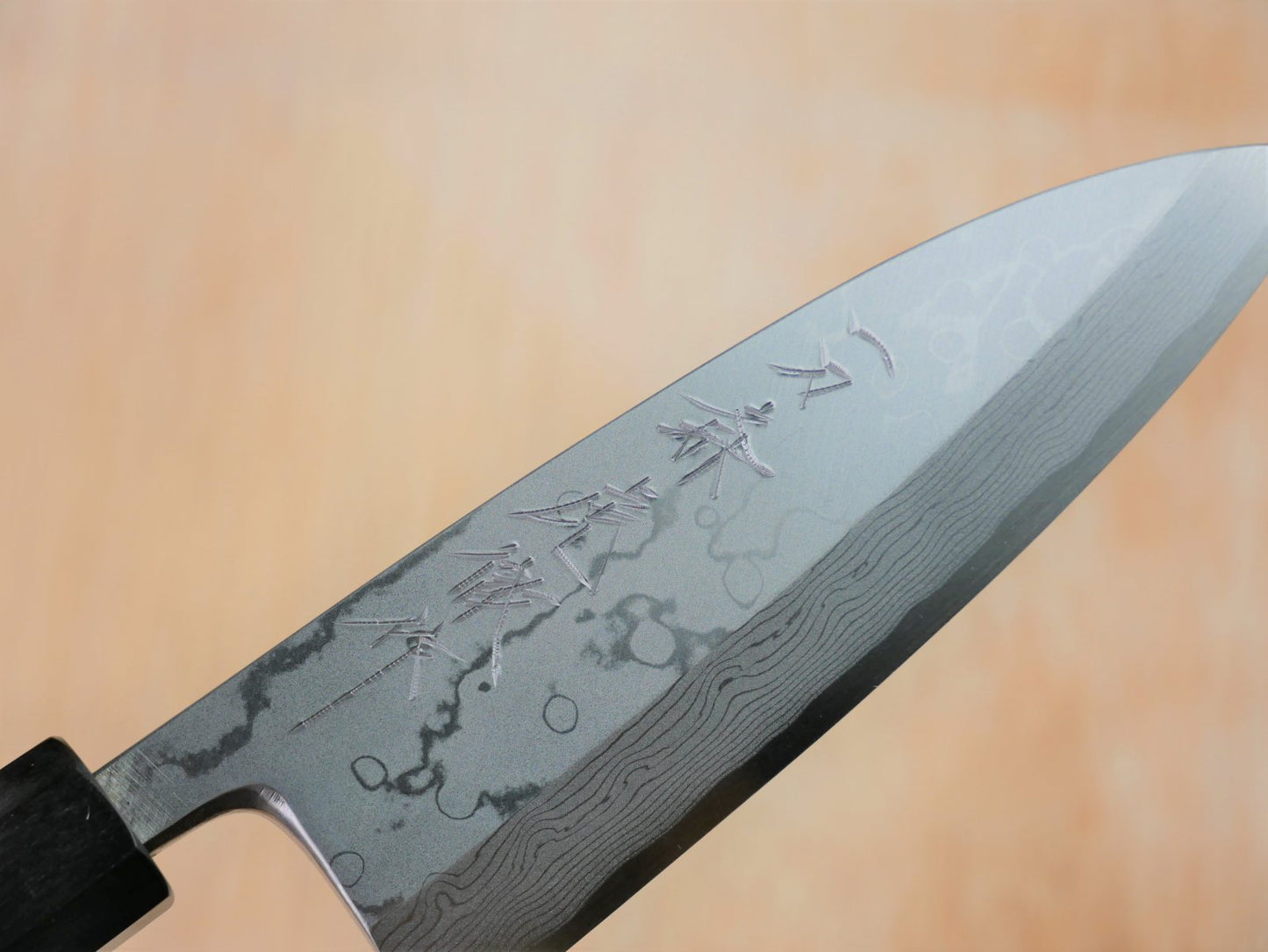 Maker's mark on blade face of 150mm Aogami Deba forged by Takahashikusu