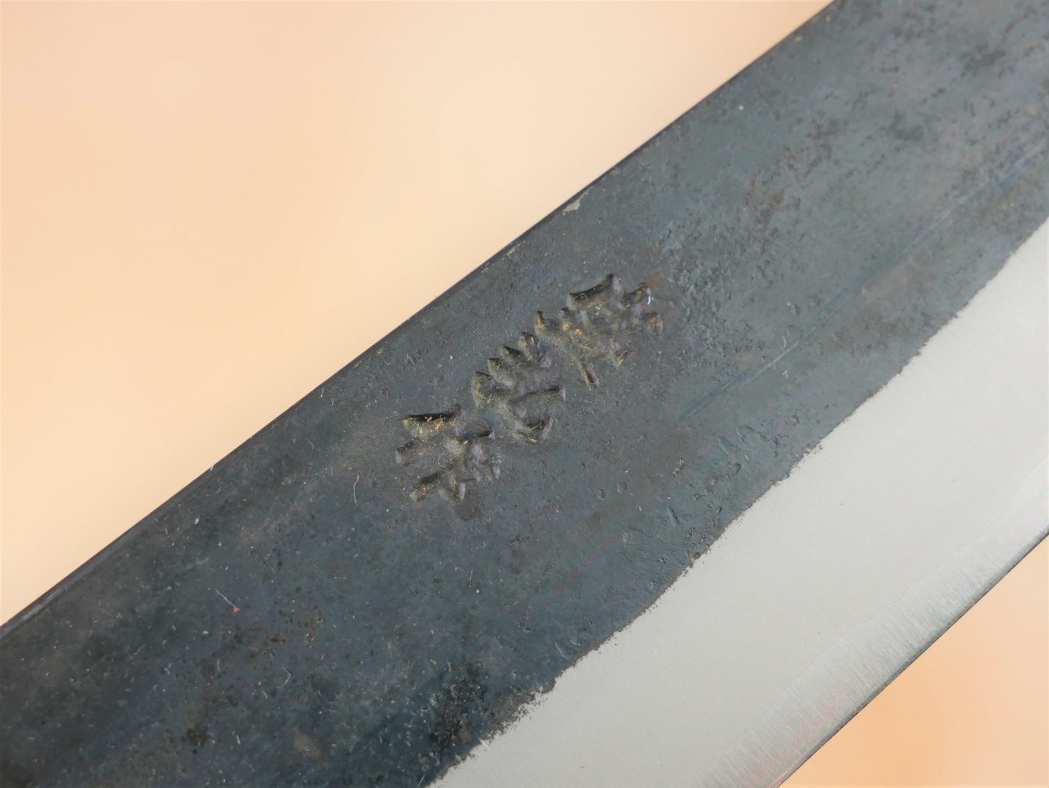 Maker's mark on blade face of 180mm Aogami No.2 Kurouchi Gyuto forged by Yasuaki Taira