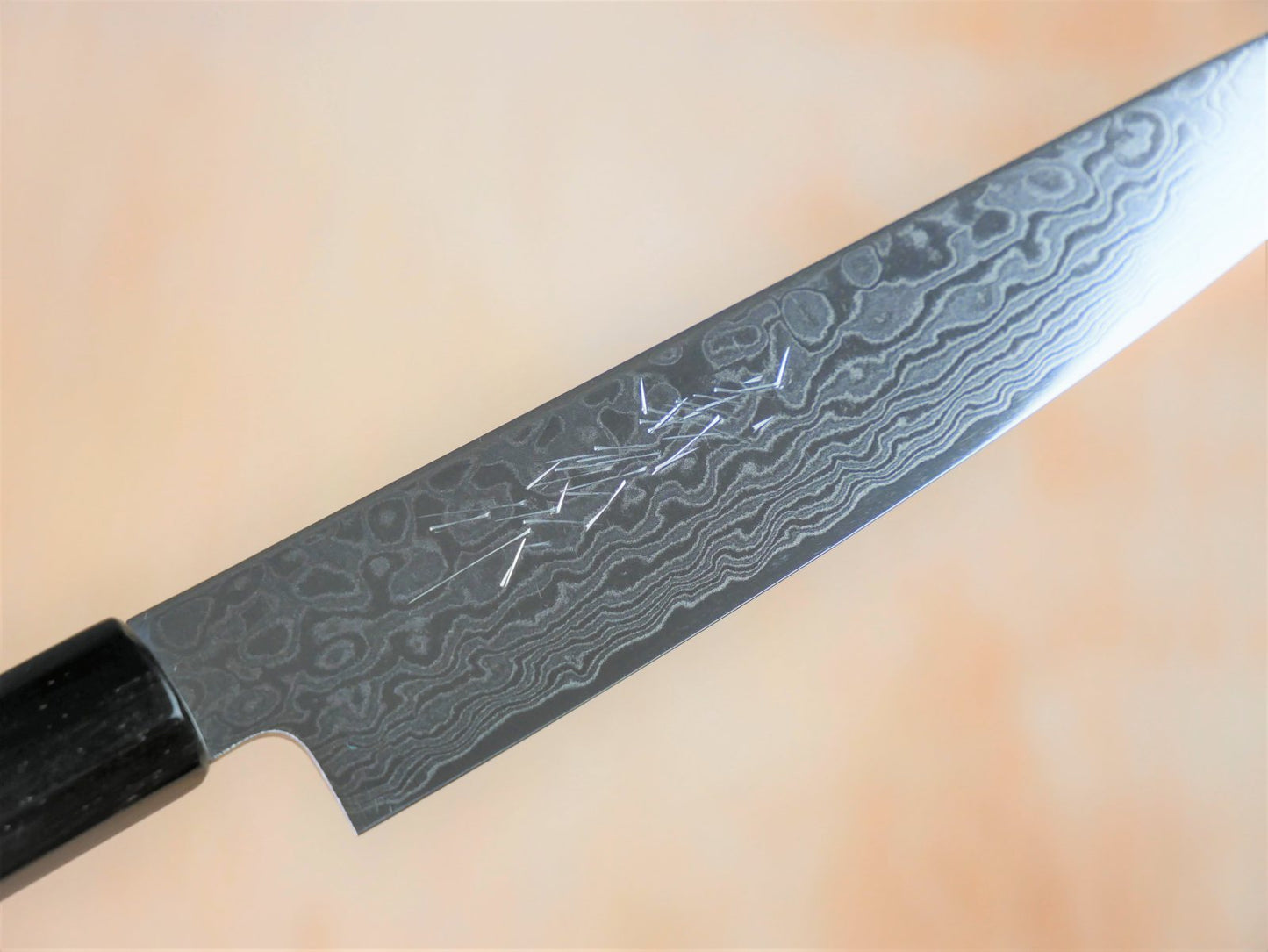 Maker's mark on blade face of 150mm ZA18 damasucus petty forged by Yamawaki Hamono