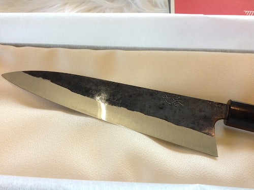 Gravur eines Asano-Schmiedemessers