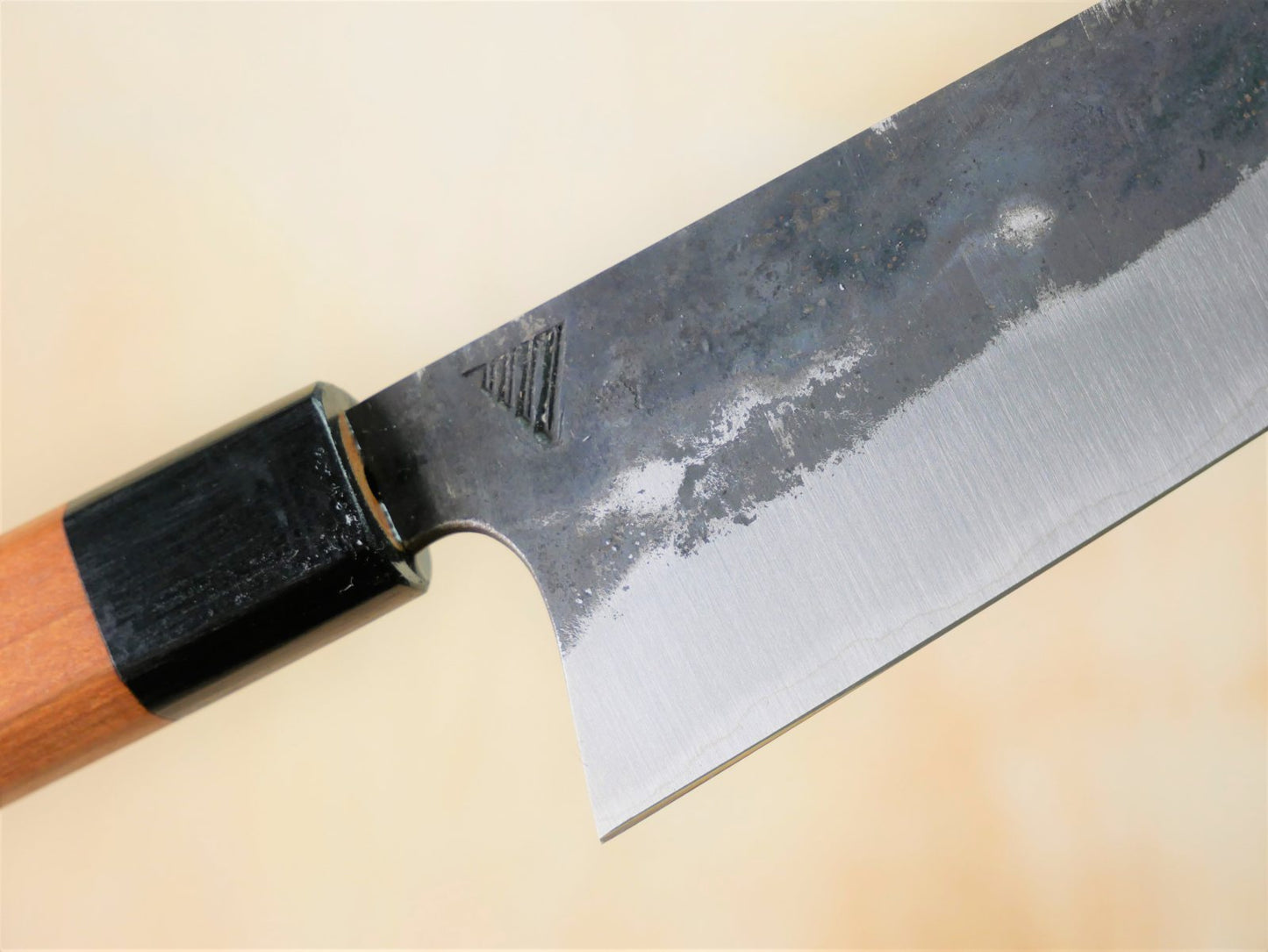 Maker's mark on blade face of kurouchi gyuto forged by Asano Fusataro