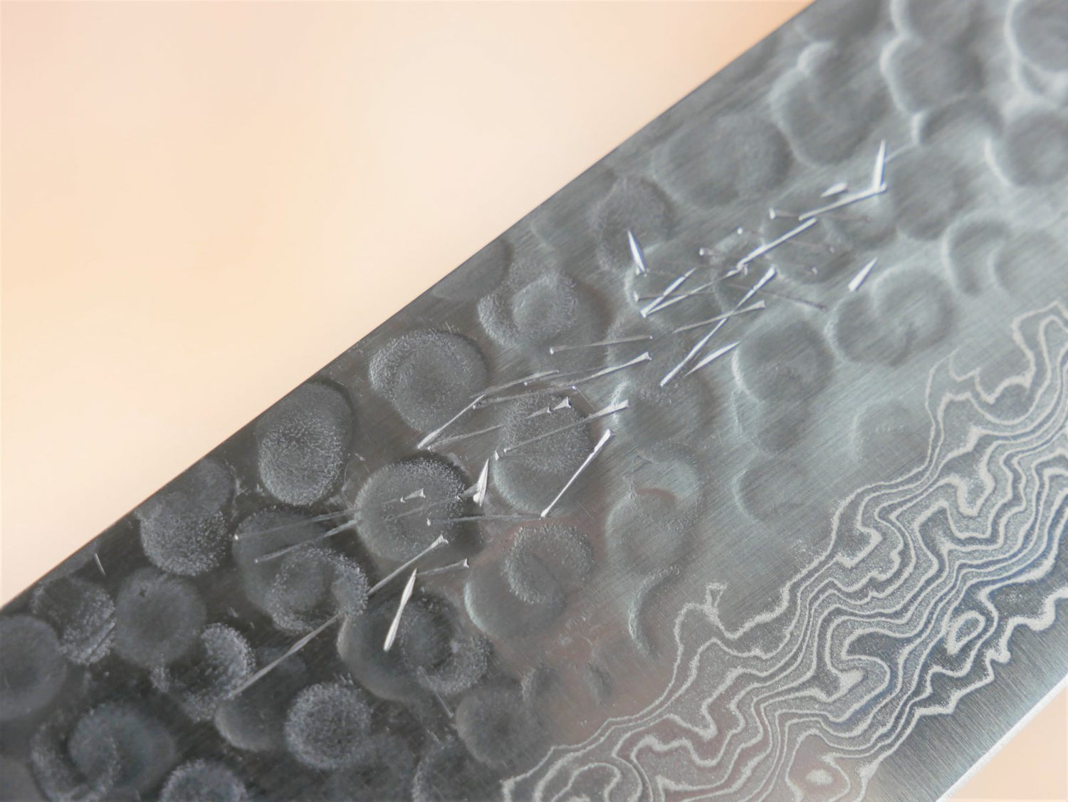 Maker's mark on blade face of 210 mm VG10 hammered Gyuto forged by Yamawaki Hamono