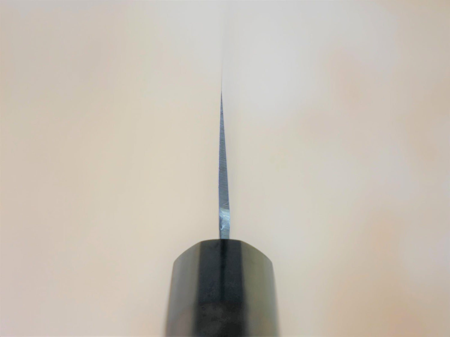Heel of 180 mm VG10 hammered Gyuto forged by Yamawaki Hamono